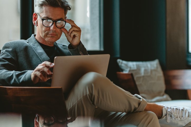 A man reviewing his compensation package.