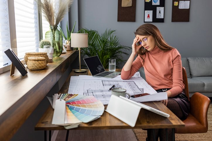 A woman reviewing her asset allocation.