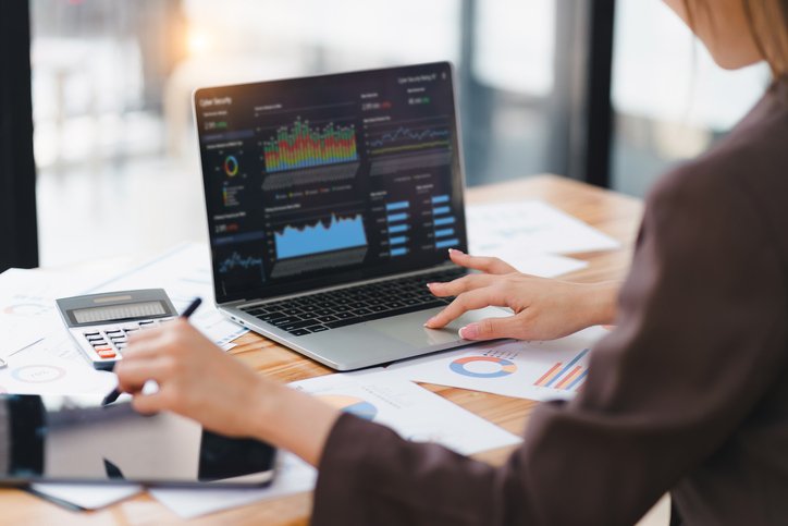 An investor reviewing the performance of her cross-border investments.